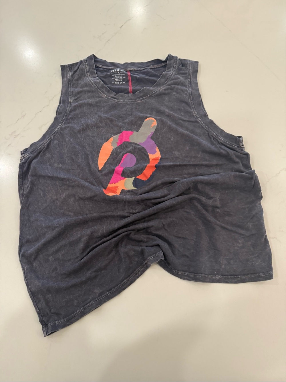 Women’s peloton Black Muscle Tank with Multicolor Logo